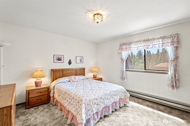 110 Icicle Unit K, Leavenworth, WA 98826 - bedroom featuring a baseboard radiator and light carpet