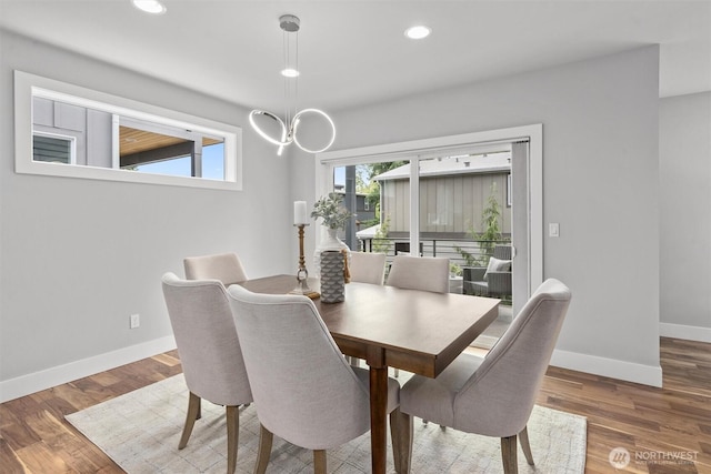 9909 123rd Ln NE, Kirkland, WA 98033 - dining room with a chandelier, recessed lighting, and wood finished floors