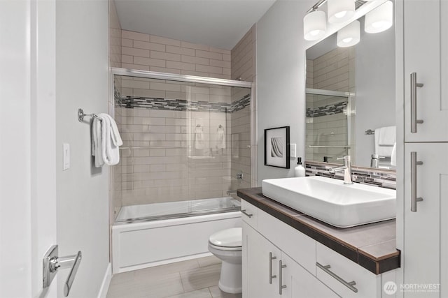 9909 123rd Ln NE, Kirkland, WA 98033 - bathroom with vanity and shower / bath combination with glass door