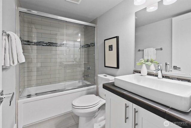 9909 123rd Ln NE, Kirkland, WA 98033 - full bath with vanity and combined bath / shower with glass door
