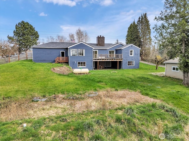5041 Guide Meridian, Bellingham, WA 98226 - rear view of house with a wooden deck and a chimney