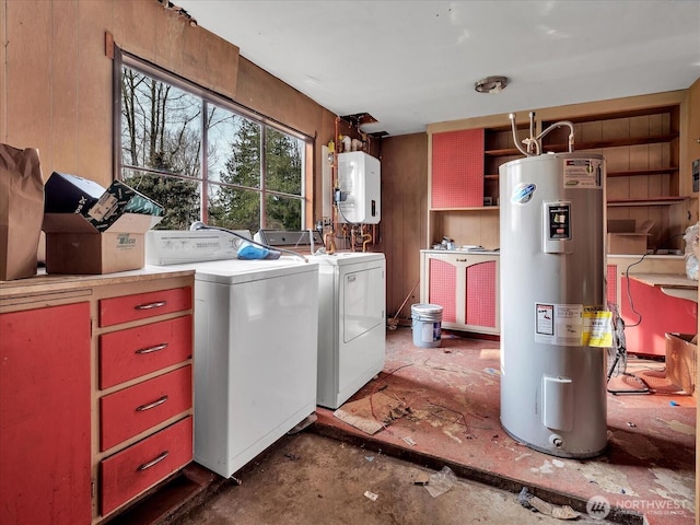 5041 Guide Meridian, Bellingham, WA 98226 - washroom with electric water heater, separate washer and dryer, and water heater