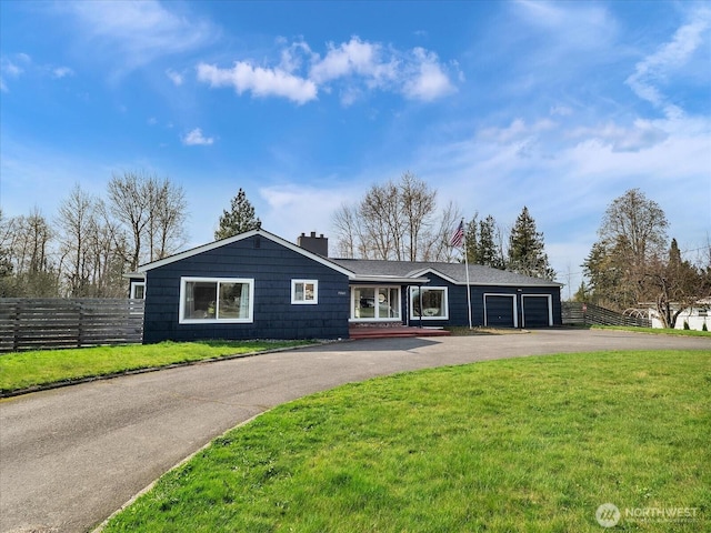 5041 Guide Meridian, Bellingham, WA 98226 - ranch-style house with a chimney, asphalt driveway, and a garage