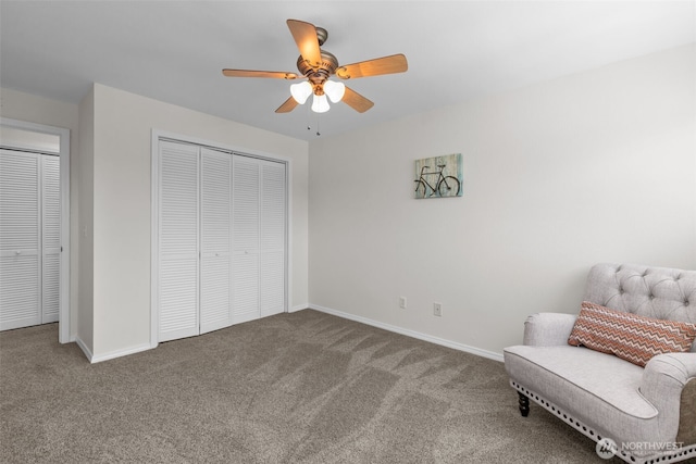 15152 65th Ave S Unit 818, Tukwila, WA 98188 - living area featuring carpet flooring and ceiling fan