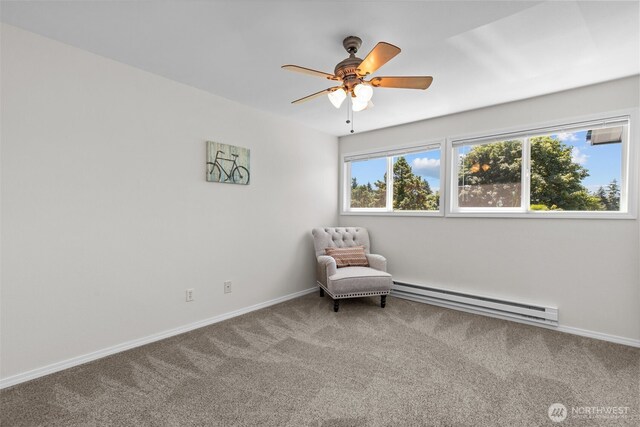 15152 65th Ave S Unit 818, Tukwila, WA 98188 - unfurnished room with a baseboard radiator, carpet flooring, and a ceiling fan