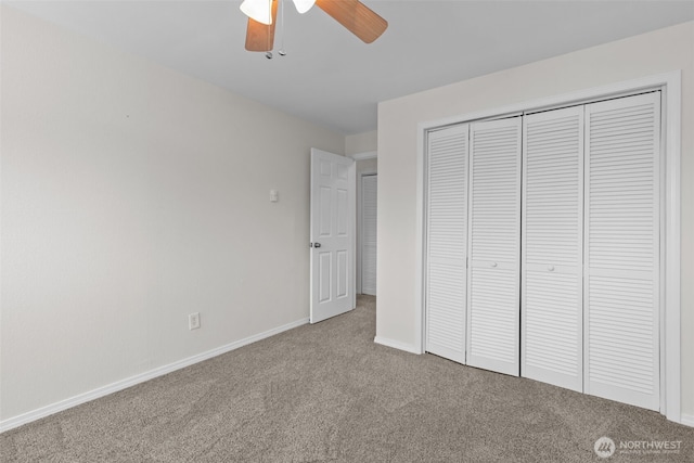 15152 65th Ave S Unit 818, Tukwila, WA 98188 - unfurnished bedroom featuring carpet flooring, a closet, and a ceiling fan