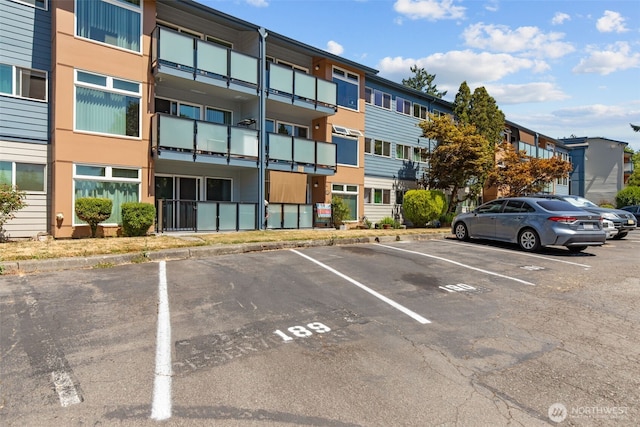 15152 65th Ave S Unit 818, Tukwila, WA 98188 - view of building exterior featuring uncovered parking