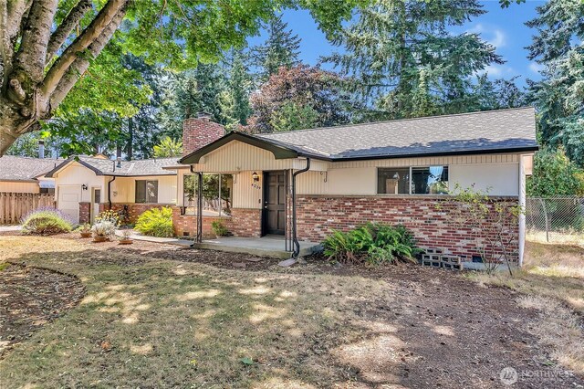 4239 S 184th Pl, Seatac, WA 98188 - single story home featuring brick siding, an attached garage, a chimney, and roof with shingles