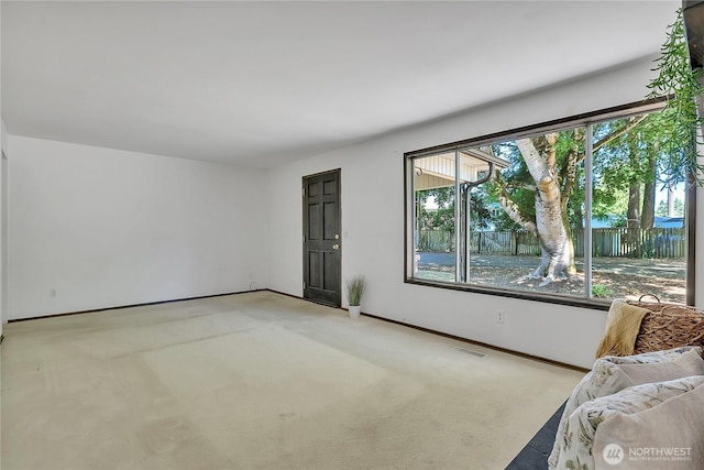 4239 S 184th Pl, Seatac, WA 98188 - unfurnished living room featuring light carpet