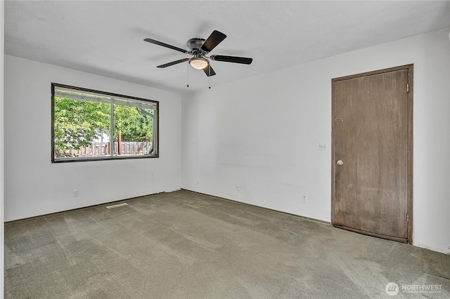4239 S 184th Pl, Seatac, WA 98188 - unfurnished room featuring carpet floors and ceiling fan