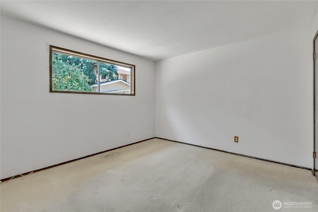 4239 S 184th Pl, Seatac, WA 98188 - unfurnished room with light carpet and baseboards