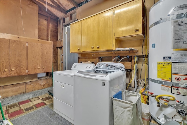 4239 S 184th Pl, Seatac, WA 98188 - laundry area featuring secured water heater, cabinet space, and washer and clothes dryer