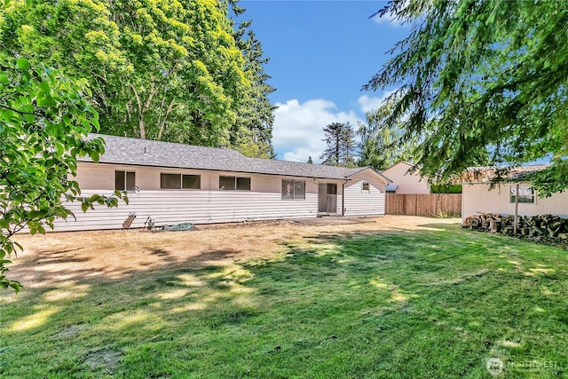 4239 S 184th Pl, Seatac, WA 98188 - back of house featuring roof with shingles
