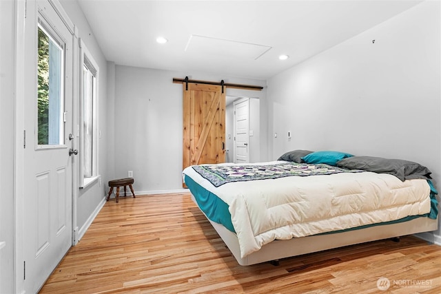 3915 Gilmore Rd, Everson, WA 98247 - bedroom with light wood-style floors, a barn door, and recessed lighting