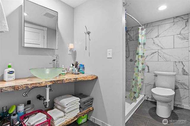3915 Gilmore Rd, Everson, WA 98247 - full bathroom featuring a shower stall, recessed lighting, and tile walls