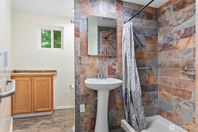 3915 Gilmore Rd, Everson, WA 98247 - bathroom featuring a stall shower and wood finished floors