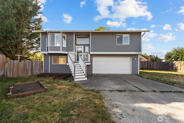 1713 S 30th St, Mount Vernon, WA 98274 - raised ranch featuring driveway and a garage