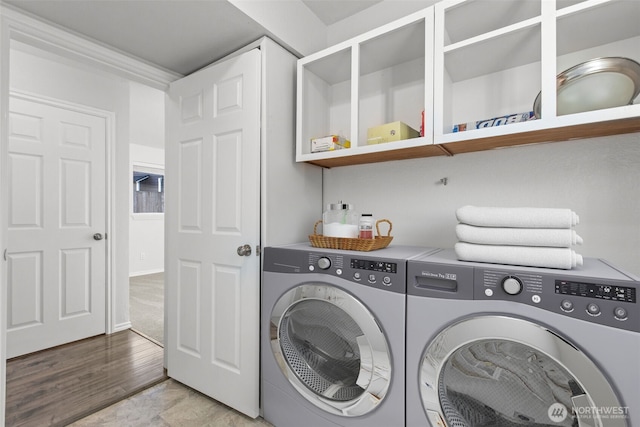 1713 S 30th St, Mount Vernon, WA 98274 - laundry room with washer and clothes dryer and light wood finished floors