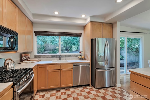 14627 SE Newport Way, Bellevue, WA 98006 - kitchen featuring stainless steel appliances, light countertops, light floors, recessed lighting, and light brown cabinets
