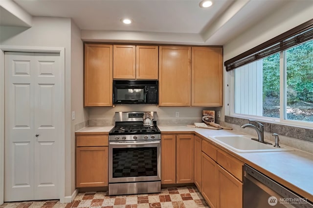 14627 SE Newport Way, Bellevue, WA 98006 - kitchen featuring stainless steel appliances, light countertops, and recessed lighting