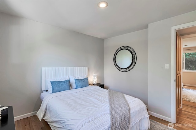 14627 SE Newport Way, Bellevue, WA 98006 - bedroom with wood finished floors and recessed lighting