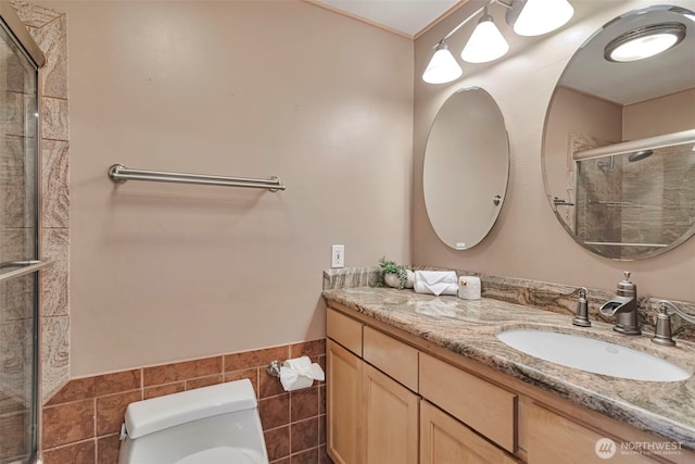 14627 SE Newport Way, Bellevue, WA 98006 - full bathroom with tiled shower, vanity, tile walls, and a wainscoted wall
