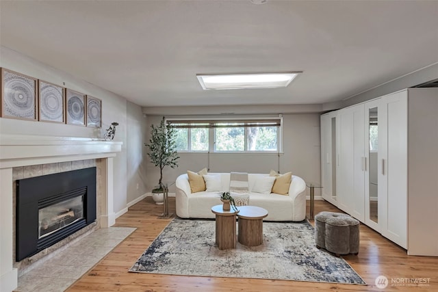 14627 SE Newport Way, Bellevue, WA 98006 - living area with light wood finished floors and a tile fireplace