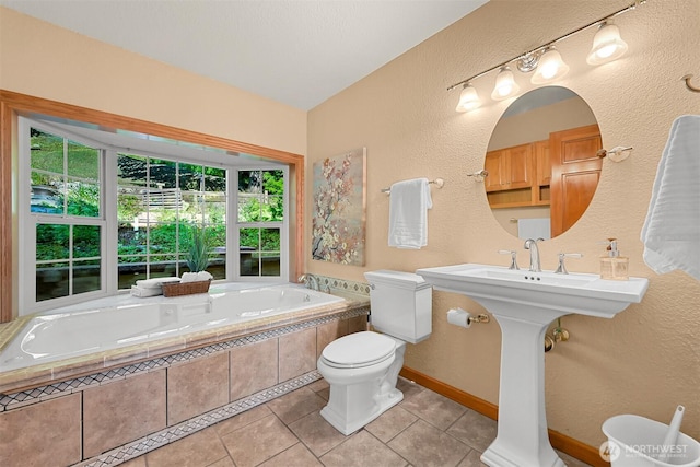 4054 Cabrant Rd, Everson, WA 98247 - full bath featuring tile patterned flooring, a garden tub, and a textured wall