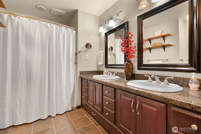 4054 Cabrant Rd, Everson, WA 98247 - full bath with double vanity, a textured wall, and curtained shower