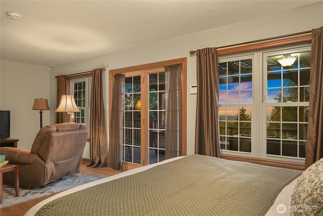 4054 Cabrant Rd, Everson, WA 98247 - bedroom with access to outside and wood finished floors