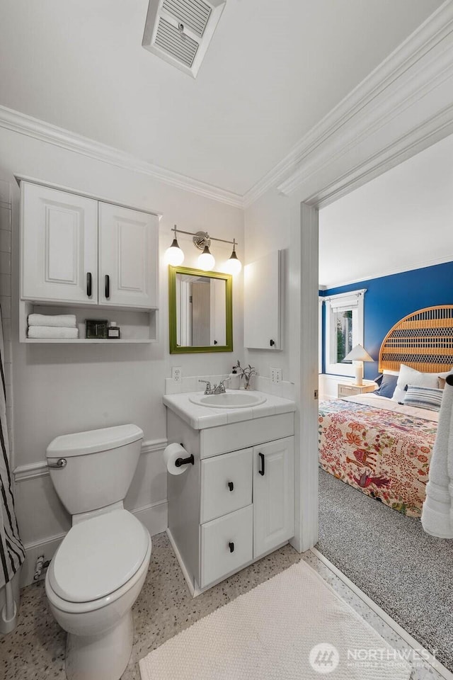 727 N 85th St Unit 102, Seattle, WA 98103 - ensuite bathroom with crown molding and vanity