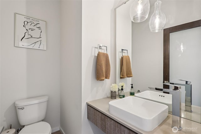 16204 27th Street Ct E, Lake Tapps, WA 98391 - half bathroom featuring toilet and vanity