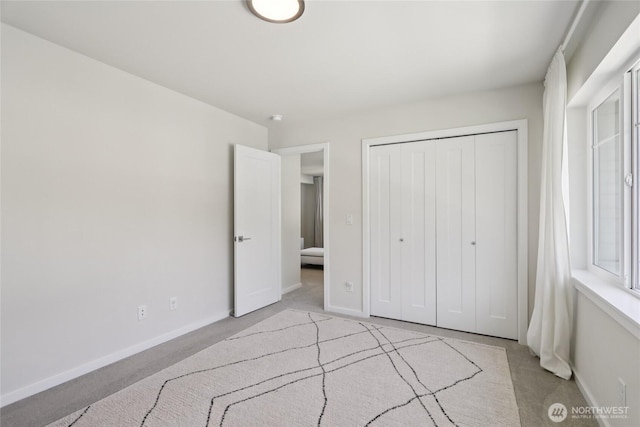 16204 27th Street Ct E, Lake Tapps, WA 98391 - unfurnished bedroom featuring light colored carpet and a closet