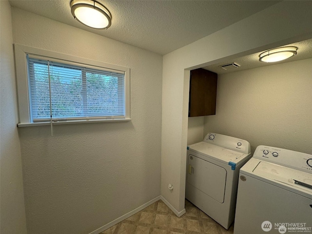 16425 Broadway Ave, Snohomish, WA 98296 - laundry room featuring independent washer and dryer and a textured ceiling