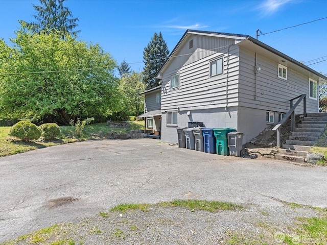 16425 Broadway Ave, Snohomish, WA 98296 - view of property exterior featuring stairway