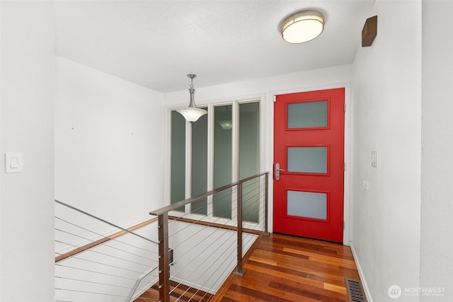 3527 Cain Rd SE, Olympia, WA 98501 - staircase with wood finished floors and baseboards