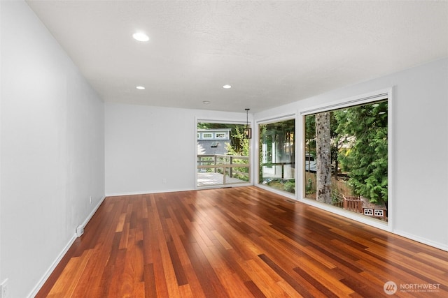 3527 Cain Rd SE, Olympia, WA 98501 - spare room featuring wood finished floors and recessed lighting