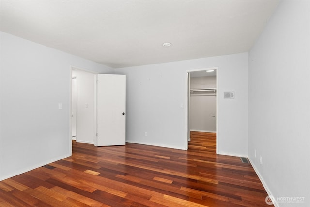 3527 Cain Rd SE, Olympia, WA 98501 - unfurnished bedroom with wood finished floors and a spacious closet