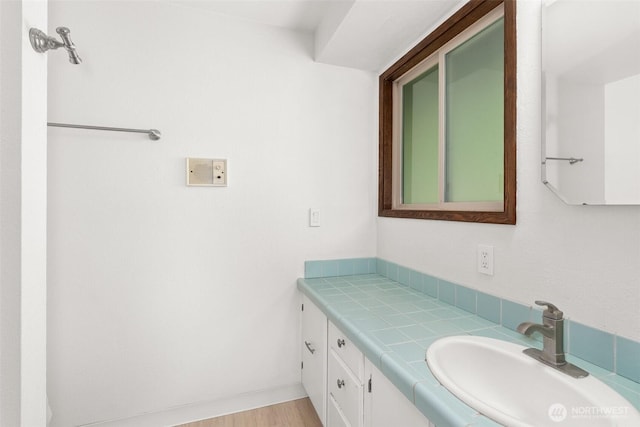 3527 Cain Rd SE, Olympia, WA 98501 - bathroom featuring vanity and wood finished floors