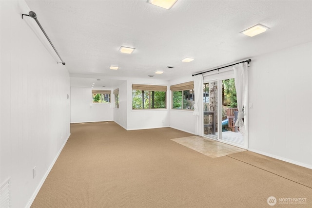 3527 Cain Rd SE, Olympia, WA 98501 - carpeted spare room featuring baseboards