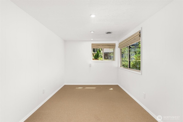 3527 Cain Rd SE, Olympia, WA 98501 - carpeted empty room with baseboards and recessed lighting