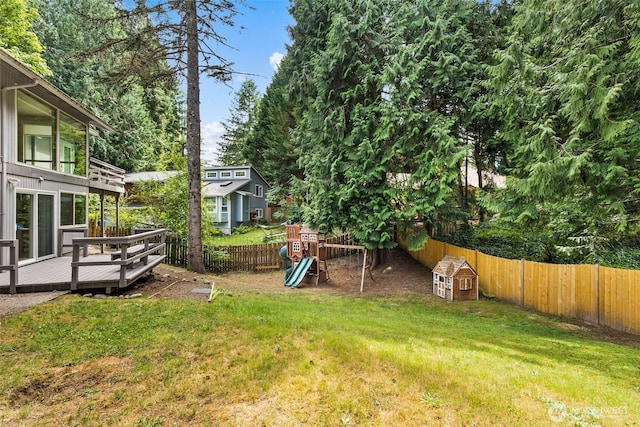 3527 Cain Rd SE, Olympia, WA 98501 - fenced backyard with a playground and a deck