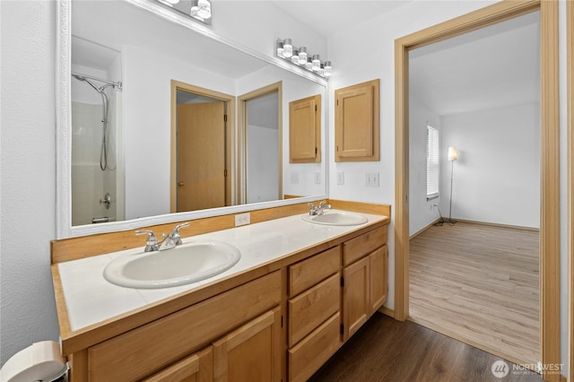 19350 113th Ave SE, Kent, WA 98031 - bathroom with double vanity, wood finished floors, and a shower