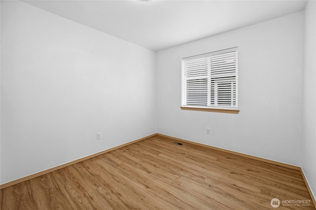 19350 113th Ave SE, Kent, WA 98031 - spare room with wood finished floors