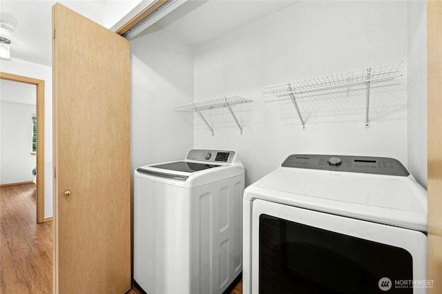19350 113th Ave SE, Kent, WA 98031 - laundry room featuring separate washer and dryer and light wood-style flooring