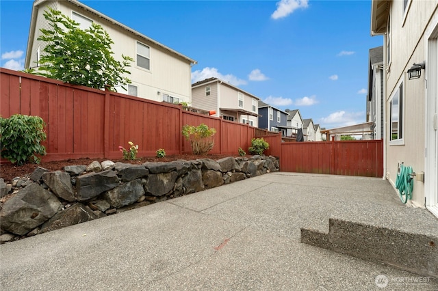 19350 113th Ave SE, Kent, WA 98031 - fenced backyard with a residential view and a patio