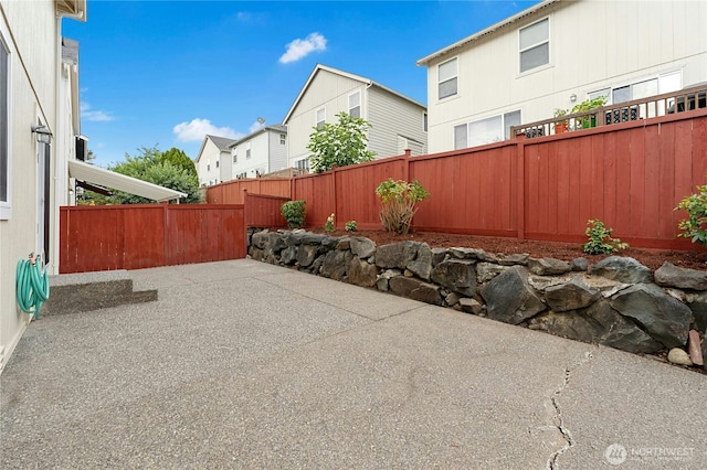 19350 113th Ave SE, Kent, WA 98031 - fenced backyard with a patio and a residential view