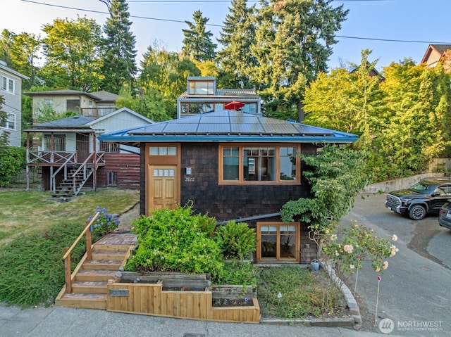 3522 S Leschi Pl, Seattle, WA 98144 - view of front of home featuring a vegetable garden and a metal roof