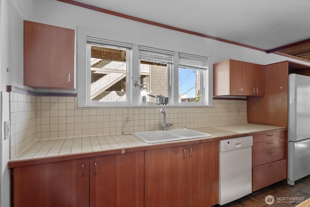 3522 S Leschi Pl, Seattle, WA 98144 - kitchen featuring white appliances, tile countertops, backsplash, brown cabinetry, and ornamental molding