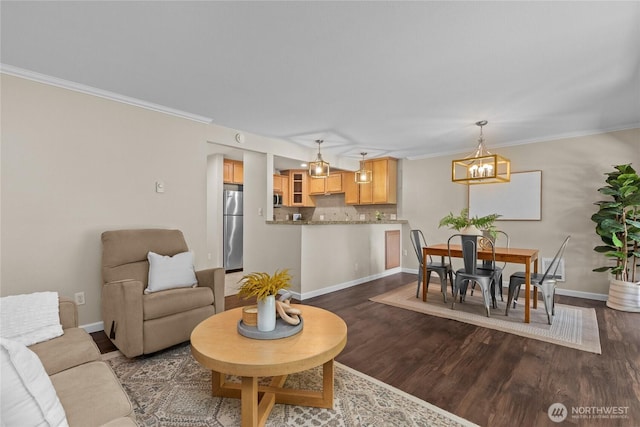 1302 N 6th St Unit 8, Tacoma, WA 98403 - living room featuring a chandelier, dark wood-type flooring, and crown molding